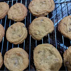 I found the batter to be REALLY sticky and hard to work with.
The first batch of cookies were all right, but they get really hard quickly. So I wouldn't want to eat them unless they were fresh out of the oven.
Subsequent batches burned on the outside too quickly and were really crunchy. So if you need to make more than one batch (I got about 40 cookies from the recipe), you MUST let the baking sheet cool completely.